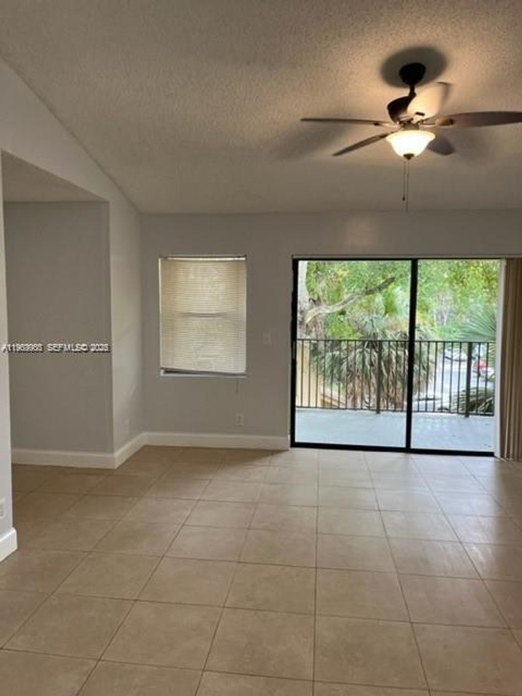 Photo of 9999 Summerbreeze Dr #1009, Sunrise, FL 33322 (MLS # A11963903)