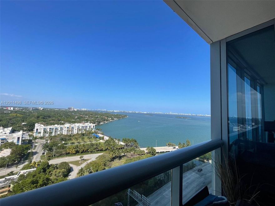 Experience elevated living in this elegant 1-bedroom, 1.5-bath residence with beautiful Intracoastal views from the 17th floor. Walls of hurricane-impact glass open to a private balcony, filling the space with natural light and showcasing serene water vistas. This well-appointed condo features wood floors, a modern kitchen with stainless steel appliances, an in-unit washer and dryer, a spacious bedroom with floor-to-ceiling windows, and updated bathrooms, including a stylish powder room for guests. Ideally located with convenient access to major highways, shopping, dining, and nearby beaches, this residence offers both comfort and accessibility. Enjoy resort-style amenities including a pool, fitness center, movie room, billiard room, concierge services, and secure assigned garage parking. A great opportunity to own a beautifully finished condo with impressive views in a prime location. Schedule your private tour today.