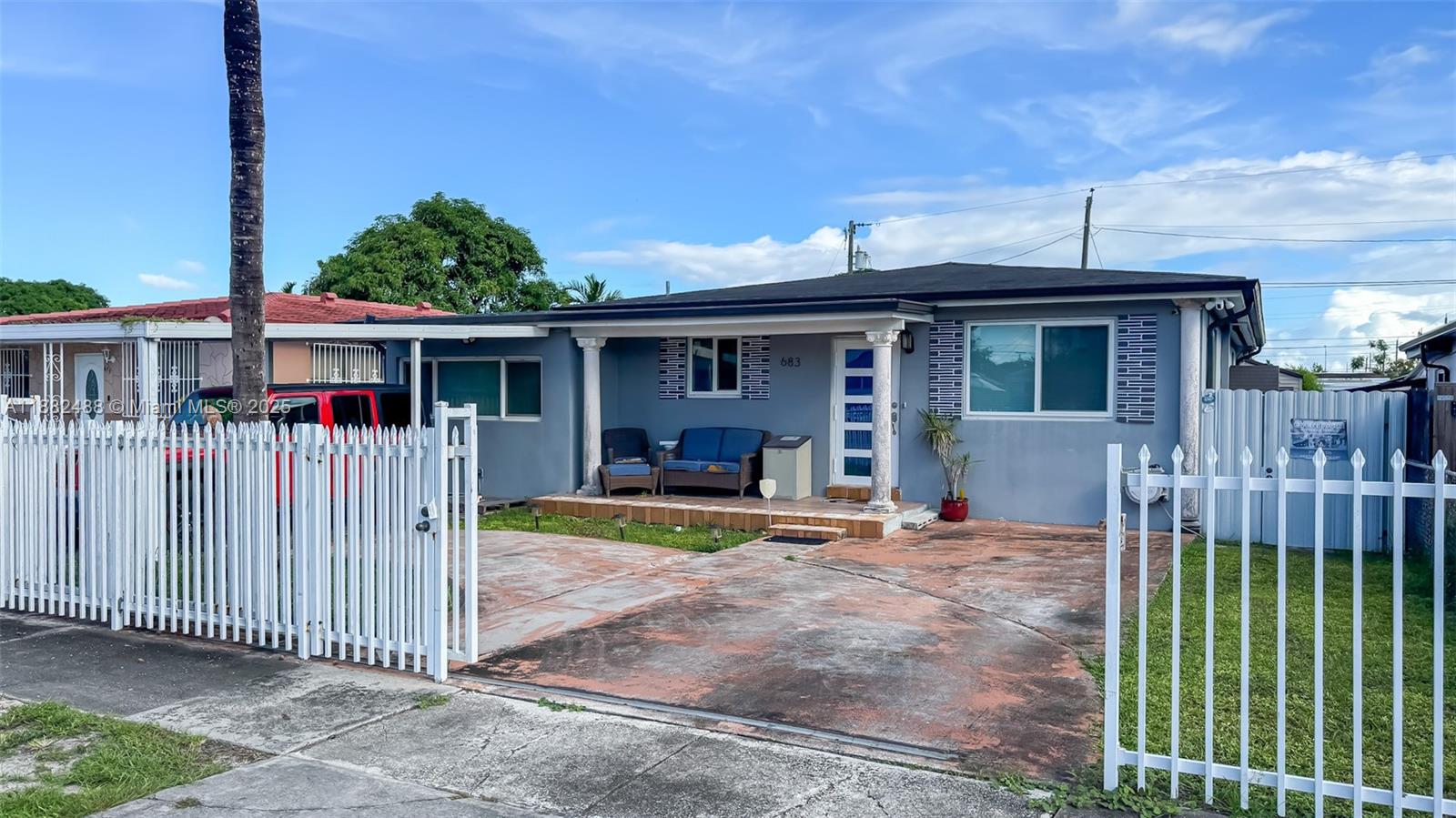 This beautifully updated 3 bedroom, 3 bathroom home features a spacious living area on a generously sized lot. The property features impact windows, an updated kitchen, and bathrooms with quartz countertops and new appliances, along with a recently replaced roof. The home boasts wood flooring, a spacious open-concept living room, a walk-in closet, and a extra room perfect for a home office. Outdoor amenities include a carport, a fenced-in driveway, a covered patio, a fenced yard, and outdoor storage sheds. An attached 1 bedroom, 1 bath unit with a separate side entrance and a small living area provides an excellent opportunity or a mother-in-law suite. This property combines modern comforts with great potential.
