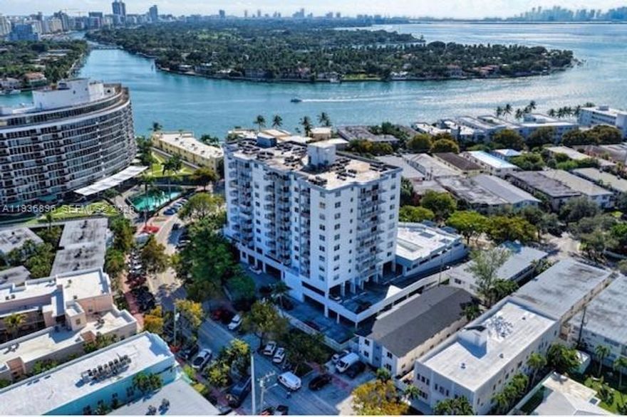 LOWEST PRICED UNIT IN BUILDING!!!! Strategically priced to allow the new owner to customize it and make it their own.  Enjoy Beautiful, Wide-Water Views of La Gorce Island & Biscayne Bay from your Private Balcony, the Perfect backdrop for Sunrise Coffee or Evening Relaxation. Spacious 1BR/1.5 BA floor plan features a generous living area, ample storage, tankless water heater, & newer AC with abundant natural light, covered assigned parking. Stanton House is a well-managed building with fully funded reserves & completed 50-Year Certification. Moments from the Beach, Shops, Dining, & all that North Beach has to offer. Ideal for end-users or investors looking to renovate and create a personalized Miami Beach Retreat.