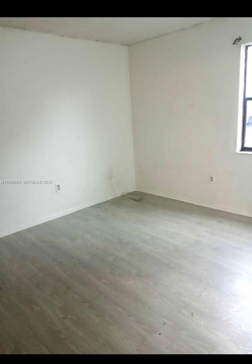 QUATRAINE CONDO IV - Residential Lease