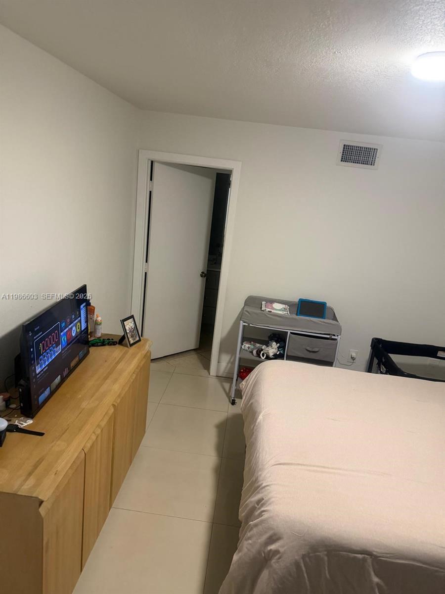 QUATRAINE CONDO IV - Residential Lease