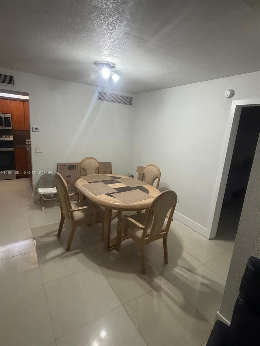 QUATRAINE CONDO IV - Residential Lease