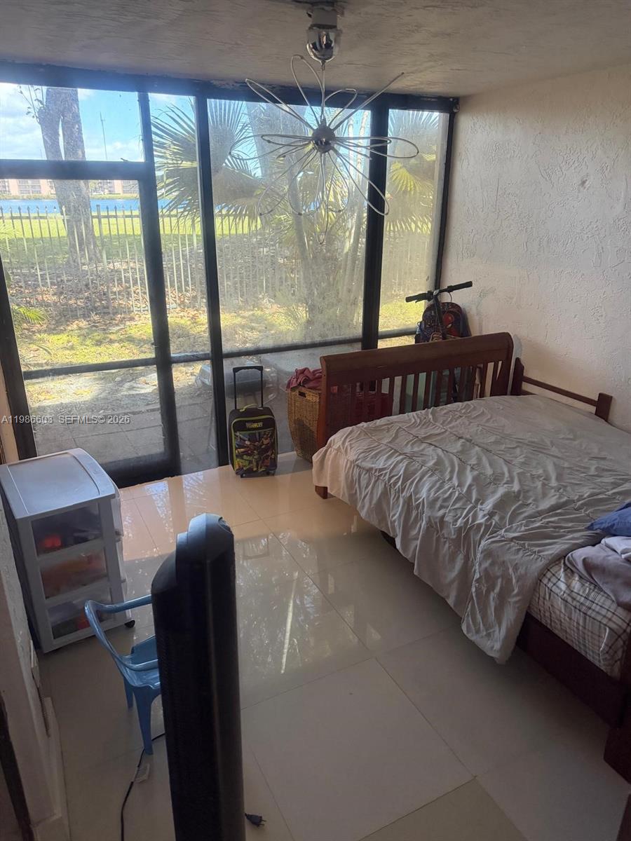 QUATRAINE CONDO IV - Residential Lease