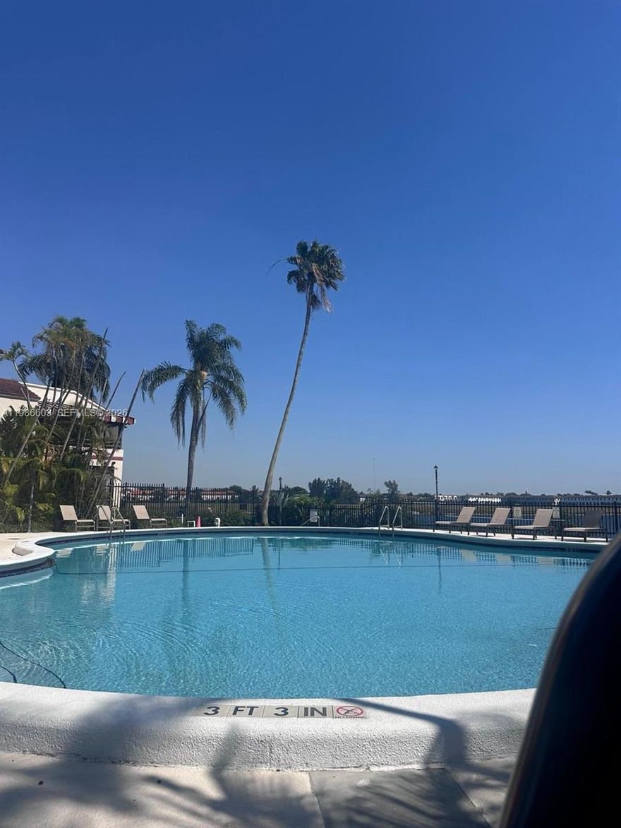 Gated community, first floor 3/2, updated kitchen and bathrooms, tiled throughout, central AC, pool, 2 parking spots, pet friendly, great size and layout, has a little outdoor area too. Available for May 1st, don't miss out!