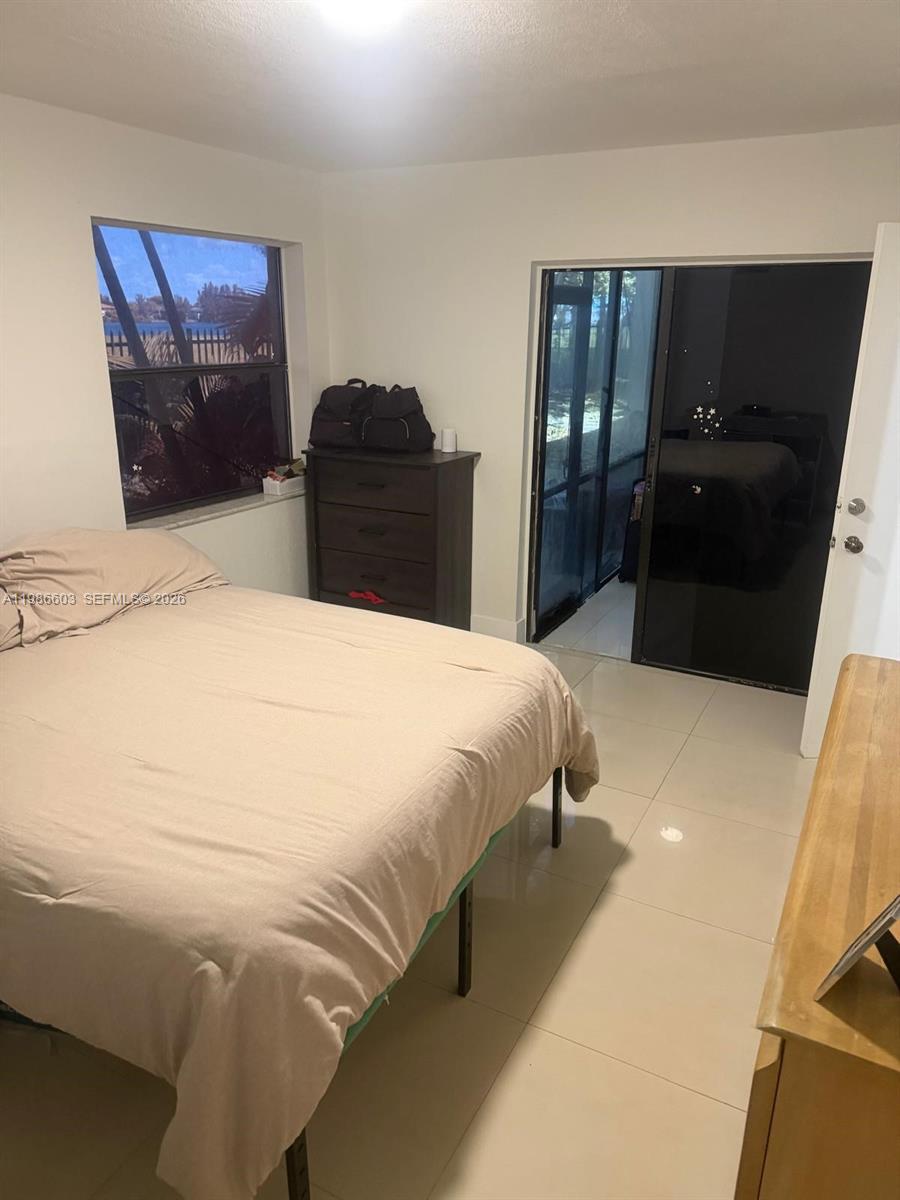 QUATRAINE CONDO IV - Residential Lease