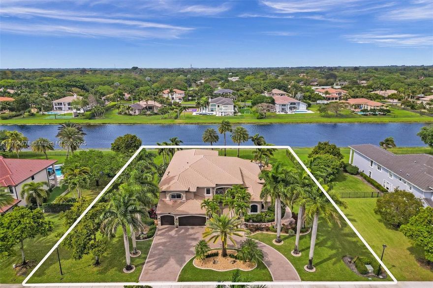 Discover luxury estate living on a waterfront lot in prestigious gated Long Lake Ranches. Nestled on nearly 1 acre, this stunning Mediterranean-inspired residence offers 6BR/5.5BA & 5,345SF of elegant space. Grand 2-story design features impact windows & doors, whole-house generator, marble floors & large loft. Expansive primary suite on ground floor boasts private sitting area & spa-like bath w/dual vanities & custom closets. Designed for effortless entertaining, outdoor paradise is a retreat, w/resort-style heated pool & spa, pergola w/sunshades, fans, TV & lights & lots of seating areas. Fully fenced w/lush landscaping. Circular driveway w/3-car garage enhances the estate’s impressive curb appeal. Clubhouse w/gym, tennis & basketball courts. Luxury, privacy, and sophistication await!