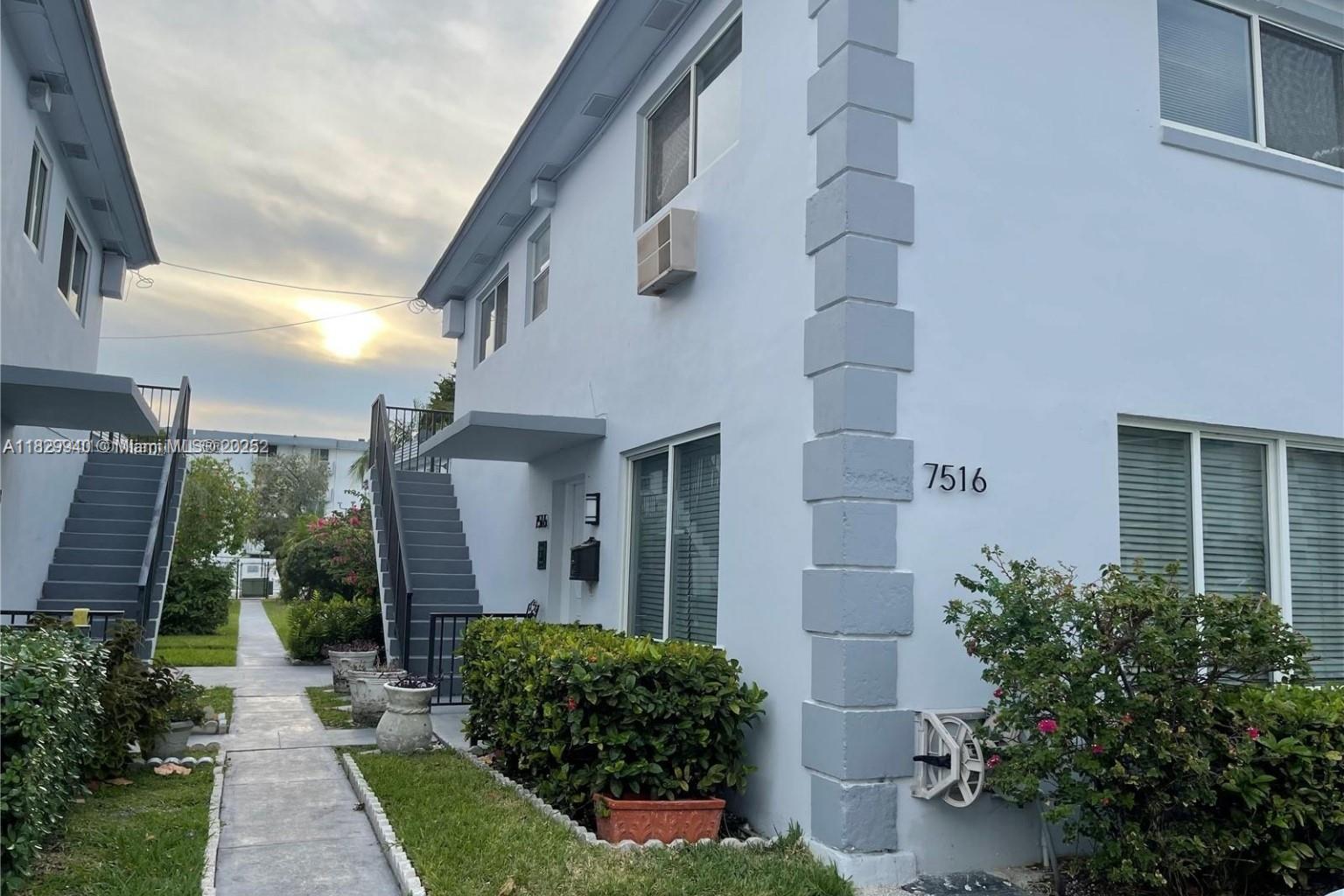 Rarely available, spacious 2-bedroom, 2.5-bathroom boutique-style townhouse in desirable Treasure Park. This charming corner unit features stainless steel appliances, new ceramic flooring throughout, and an in-unit washer for added convenience. Each bedroom includes its own private bathroom and ample storage. 5 minutes from the beach and steps away from park, and restaurants. Enjoy a large covered screened-in patio and access to the community swimming pool and BBQ area. Centrally located in North Bay Village, directly across from Treasure Island Elementary. The home boasts a spacious kitchen, high ceilings, an open living area, and a separate dining room that overlooks the enclosed backyard patio perfect for gatherings. Parking space conveniently located in front of the unit. Pet-friendly.