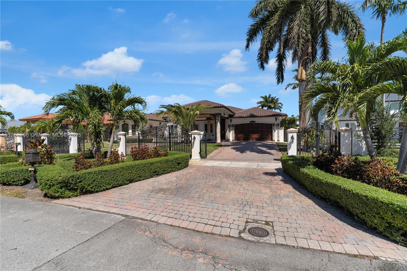 Step into luxury living with this stunning updated 5/4 home offering the perfect blend of elegance, and comfort. Sitting behind a gated entry with lush landscaping, this house features: spacious 2-car garage, impact windows, a complete alarm and camera system, the gourmet kitchen boasts custom wood cabinetry, granite countertops, stainless steel appliances—perfect for entertaining. Enjoy the resort-style backyard with a heated pool, Roman-style cabana, and plenty of space to relax or host family and friends. Every detail has been thoughtfully designed, from the ceilings to the expansive living areas, large bedrooms, walk-in closets and cabana bath. Located in one of Miami’s most desirable neighborhoods, close to top schools, shopping, and dining.