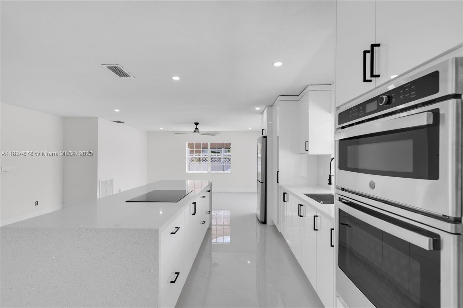 Step into this updated 3-beds, 2-bath home in the Blvd West neighborhood of Lauderhill. With over 1,780 sq.ft. of living space, this property boasts a modern interior with shiny ceramic tile floors, recessed lighting, and an abundance of natural light.
The open-concept living and dining areas provide an expansive feel perfect for entertaining, while the chef-style kitchen includes quartz countertops, a center island, premium stainless steel appliances, and ample cabinetry. Spacious bedrooms offer ceiling fans, large closets, and privacy, with bathrooms designed in contemporary finishes with frameless glass showers & elegant vanities.
Covered rear patio, the generous backyard is ideal for relaxing or future customization.
This turnkey home is move-in ready and waiting for its next owner!