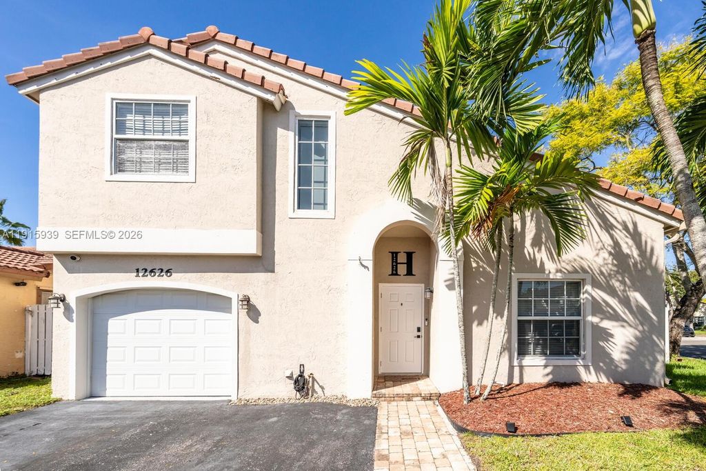 Photo of 12626 NW 15th St, Sunrise, FL 33323 (MLS # A11915939)