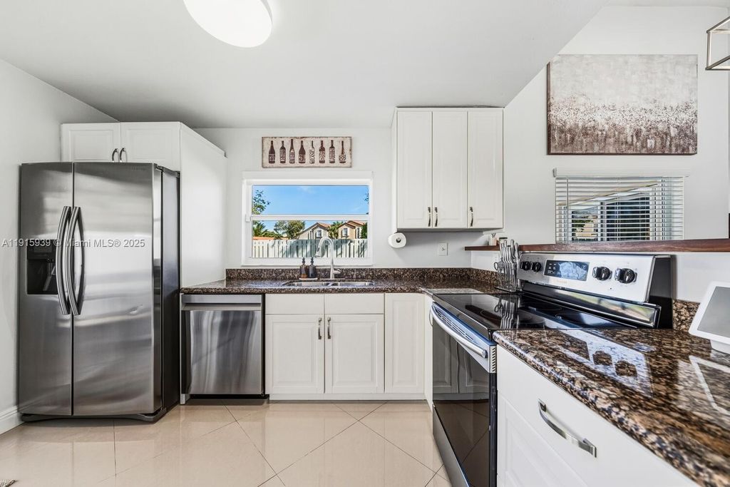 Photo of 12626 NW 15th St, Sunrise, FL 33323 (MLS # A11915939)