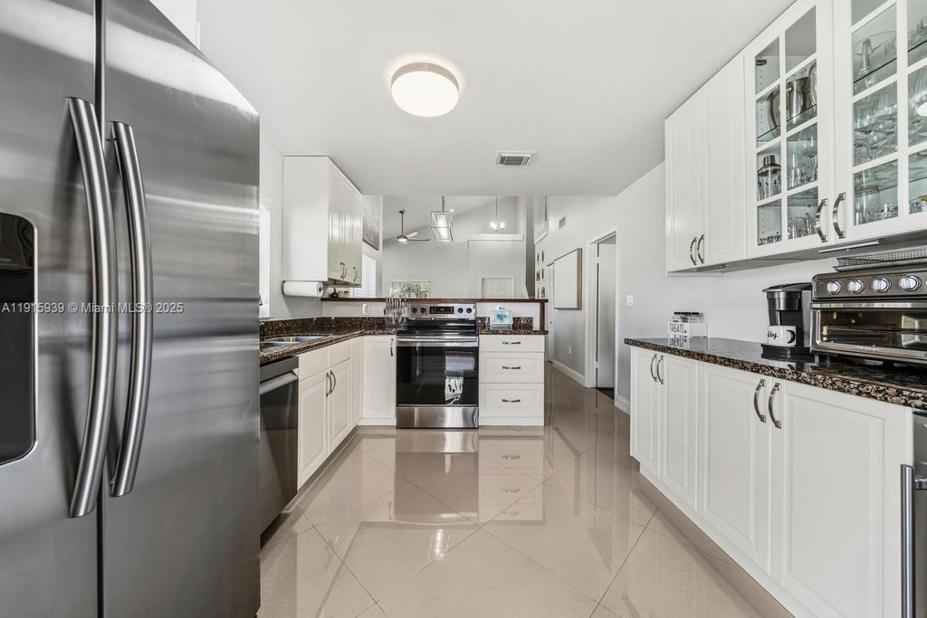 Photo of 12626 NW 15th St, Sunrise, FL 33323 (MLS # A11915939)