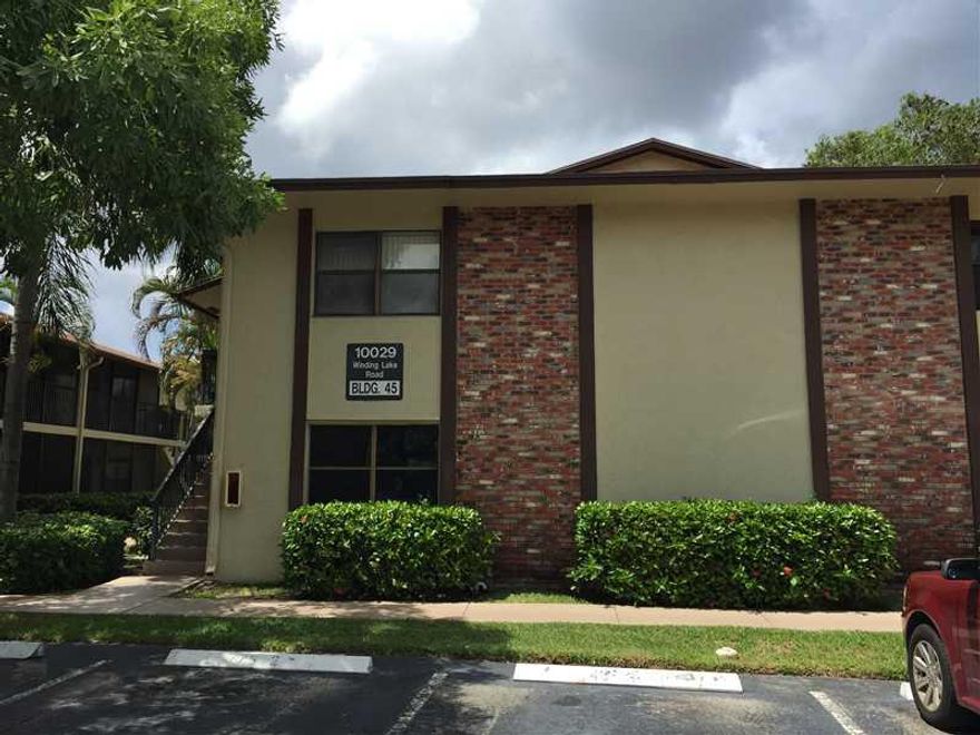 Stunning, Remodeled and Updated 1st floor, 2 bed 2 bath condo.  Open concept Kitchen with granite counters and modern lighting.  Laminate wood flooring and  6 inch baseboards throughout the residence.  Both bathrooms have been remodeled and updated.  Both  rooms have large closets and the master bedroom a walk-in closet.  Great community located minutes from Sawgrass Mills Mall, shopping, dining and entertainment. a must see!  Thank you for showing!