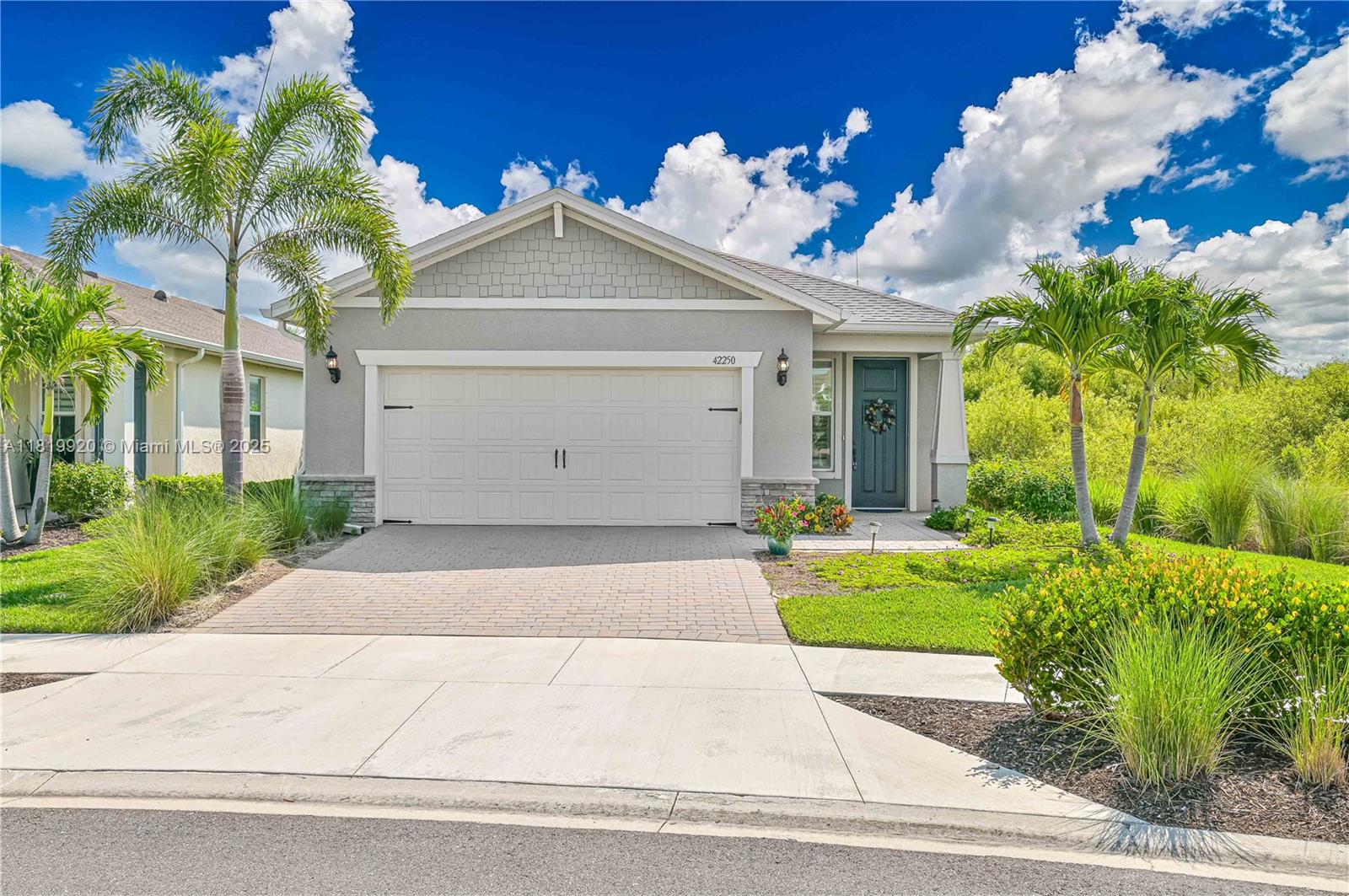 Discover a beautifully enhanced home in the Edgewater neighborhood of Babcock Ranch. This 2-bedroom + den (with closet), 2-bath home features over 1,800 sq ft of comfortable living, plus an enclosed sunroom under air—ideal for a home office, gym, or flex space. Step outside to your private heated saltwater pool, perfect for relaxing or entertaining. Inside, enjoy luxury vinyl plank flooring, upgraded KitchenAid appliances, tray ceilings, a spacious walk-in closet, epoxy-coated garage floor, and stylish finishes throughout. Located in America’s first solar-powered town, residents enjoy access to resort-style pools, fitness centers, scenic trails, and the vibrant Founder's Square. This home is move-in ready and filled with high-end upgrades!