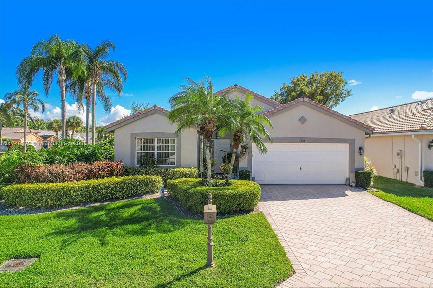 This CORNER LOT home is equipped with High vaulted ceilings, a fully remodeled kitchen, and a beautiful sunroom overlooking a plush garden. The large master suite has two walk-in closets and an En-suite bath with a roman tub, his and hers sinks, and a shower. The community is rich in activities and social clubs such as a men's club, women's club, and a drama club that all convene in the elegant clubhouse. The clubhouse also features a heated pool, jacuzzi, billiard room, tennis courts, pickleball courts and so much more! The community also has an incredible golf course and provides cable, trash, and full landscaping. DONT WAIT! SCHEDULE YOUR SHOWING NOW!
