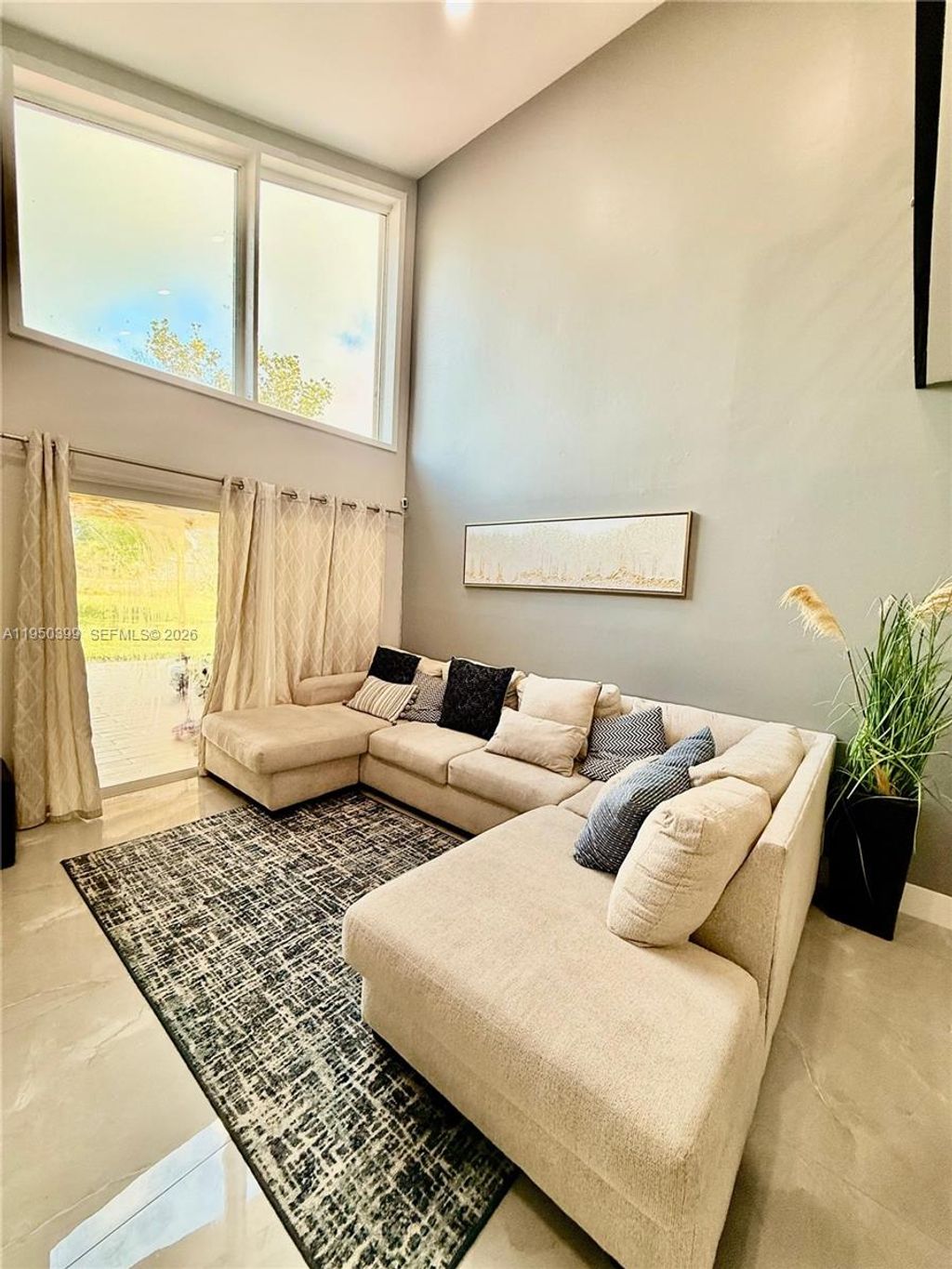 Photo of 10625 NW 30th Pl #1, Sunrise, FL 33322 (MLS # A11950399)