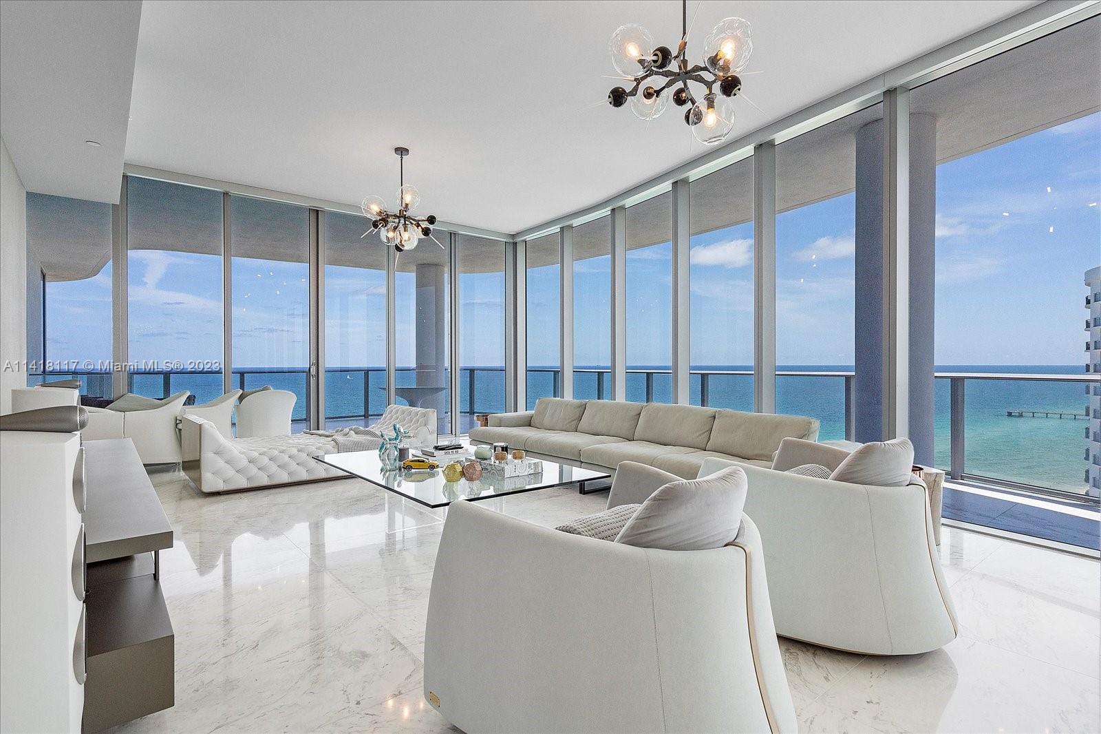 Super Luxurious apartment with the Best views! A private elevator gives you access to a tastefully furnished unit with everything you need for an enjoyable stay in the Miami beaches. Luxury amenities include: Bar/ Restaurant at the Lobby, Beach Service, Infinity Pool, High End Spa, Beauty Salon, Fitness Center, Wine Cellar and Cigar Lounge, Cinema Room and Kids Playroom.
Offered fully furnished. Nothing like this in the entire building, this 3 bedroom, 5 full & 1 half bathroom 3,340 SF unit (plus balconies)
