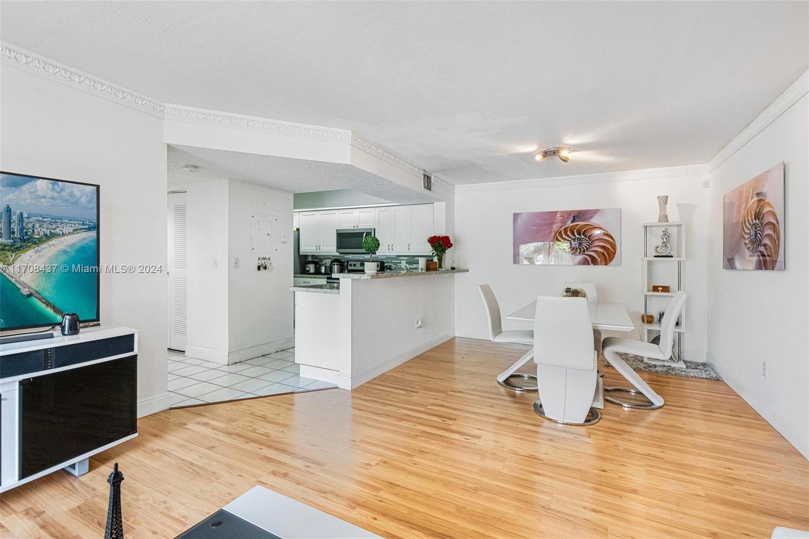 Beautiful 2nd floor corner condo unit in desirable Villa Rustica. Bright and open floor plan where living room opens to the balcony, second patio just off of the primary bedroom. Gorgeous kitchen with granite countertops, stainless steel appliances. This unit comes with (1) parking spot plus PLENTY of guest spots, community pool, tennis courts and exercise room. Full-sized washer and dryer situated in the balcony, vinyl flooring in the living room/bedrooms and tile throughout kitchen/ bathrooms. EASY TO SHOW.