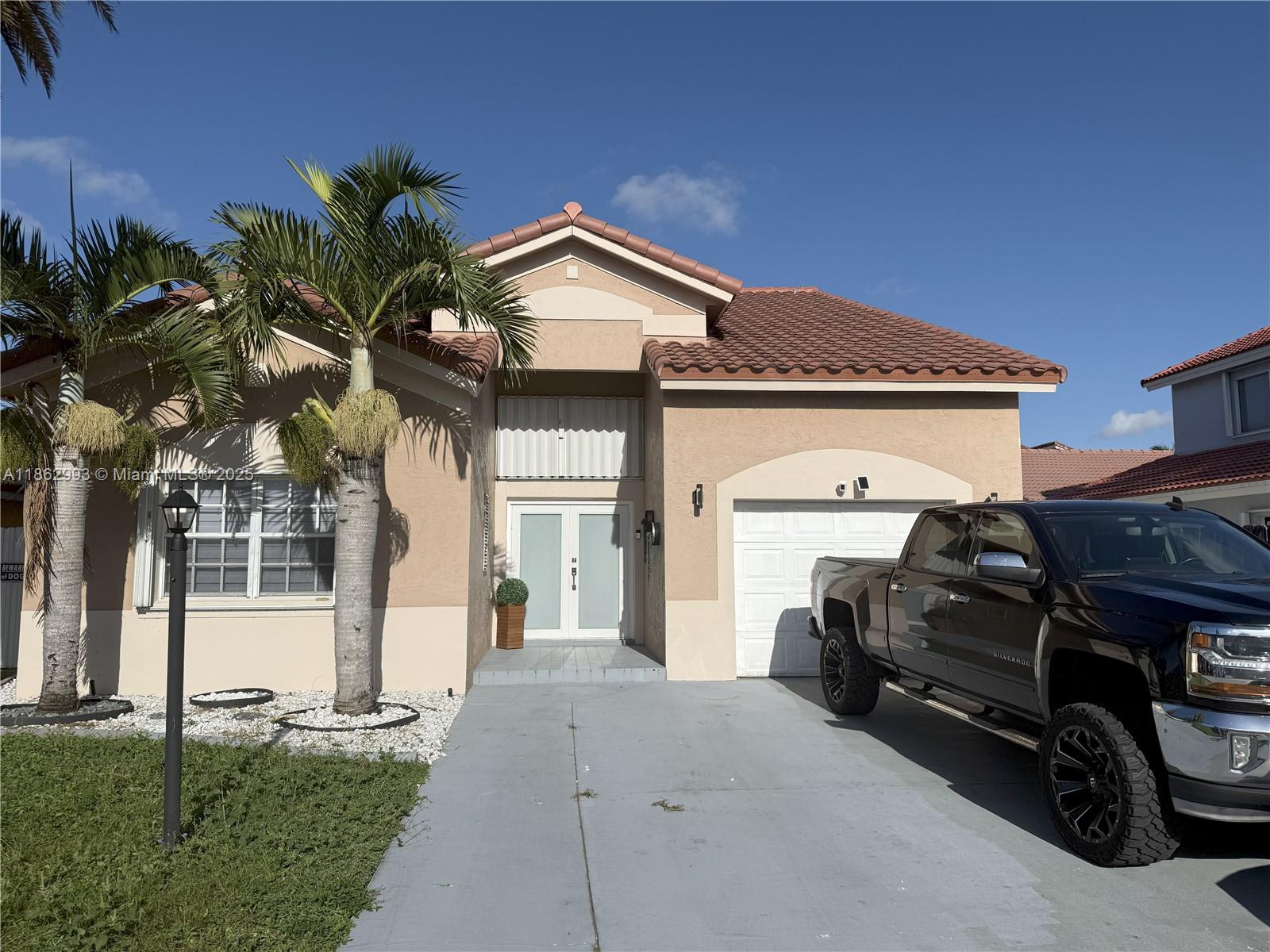 Gorgeous Modern Two-Story Monterrey Home in Miami Gardens. Turnkey and Fully Renovated. Brand NEW 2023 Roof. NEW 2023 Flooring. NEW 2023 and 2024 Bathrooms. NEW Upgraded Backyard/Terrace. Spacious Backyard has an Aluminum Roof & Outdoor for Entertaining. Low HOA! Community Amenities include Security, Basketball Court, & Pool. Surrounded by Parks and a nearby Water Park. Text listing agent for appointment. Easy to show!