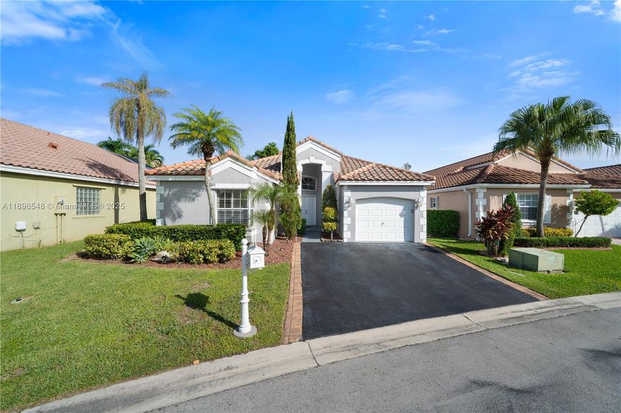 Welcome home to Bermuda Springs! This charming 3BR/2BA residence offers comfort, style, and convenience—perfect for family living. Bright and airy with an open-concept kitchen featuring quartz countertops, stainless steel appliances, and ample space for gatherings. The spacious primary suite includes a renovated bath with soaking tub and walk-in shower. Enjoy a fenced backyard oasis with a sparkling pool—ideal for entertaining. Upgrades include 2022 roof, updated kitchen, and new A/C (Sept 2025). Prime Weston location near A-rated schools (walking distance to Indian Trace Elementary & Tequesta Trace Middle), parks, shopping plazas, restaurants, major highways, and houses of worship. Move-in ready and meticulously maintained!