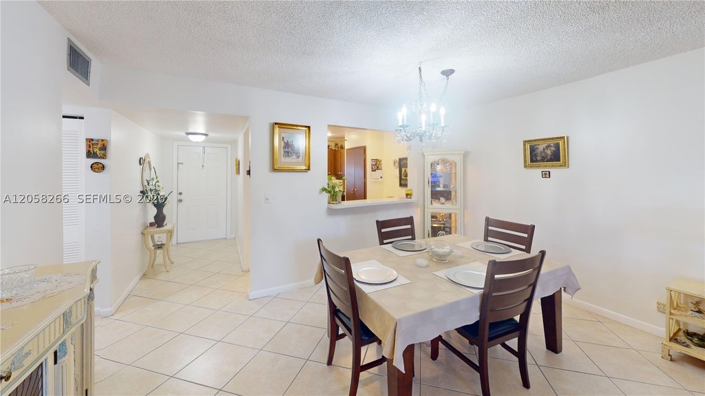 Photo of 9320 Sunrise Lakes Blvd #303, Sunrise, FL 33322 (MLS # A12058266)