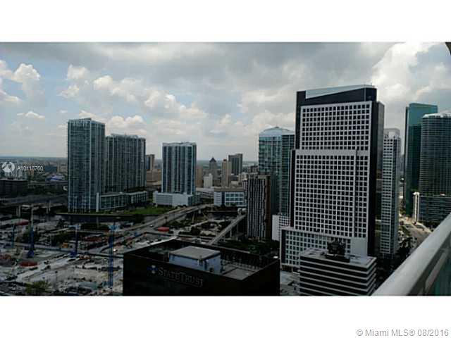 THE PLAZA 901 BRICKELL CO - Residential Lease