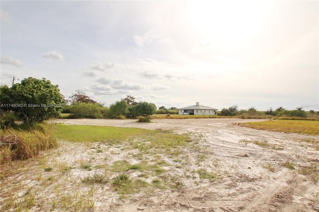 Photo of 8000 SW Conners Hwy, Okeechobee, FL 34974 (MLS # A11749080)