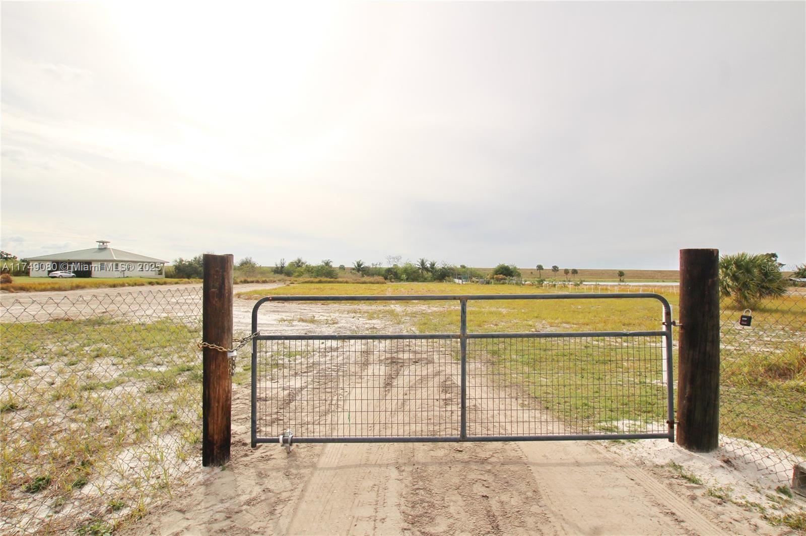 Lake Okeechobee access - plus intercoastal with no low bridges - Beautiful property that is high and dry. This is located on the Rim Canal and partially cleared. It is filled with fruit trees Lychee, Longan, Star Fruit, Sweet apple, Mango, Lemon and Orange. A perfect place to build your dream home on this 2+ acre lot.
It comes with a free zero turn tractor, generator, and more in the storage room.