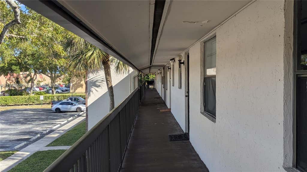 Photo of 6001 Shakerwood Cir #205, Tamarac, FL 33319 (MLS # A11998106)