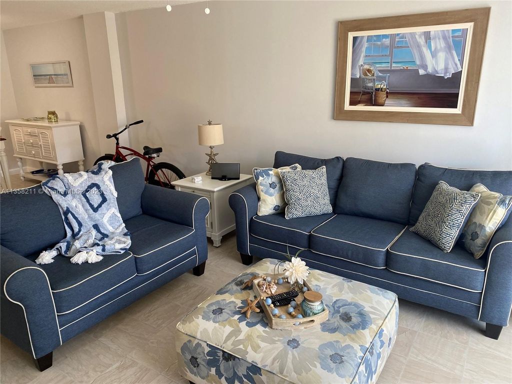 Photo of 125 Ocean Ave #402, Palm Beach Shores, FL 33404 (MLS # A11358211)