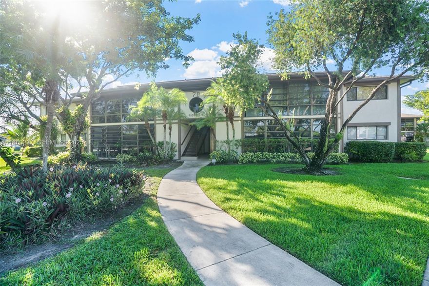 HURRY! DRASTIC PRICE REDUCTION FOR A QUICK SALE! TAMARAC GARDENS- 2/2- LAKEFRONT CONDO. Laminate floors, open kitchen concept, large rooms. This ALL AGES welcome community offers comfort, convenience, and a beautiful lake view right from your private balcony — perfect for relaxing mornings or serene evenings. Enjoy peace of mind with a well-kept unit in a quiet, friendly community, located just minutes from major highways, shopping centers, restaurants, and more. Come make an offer!