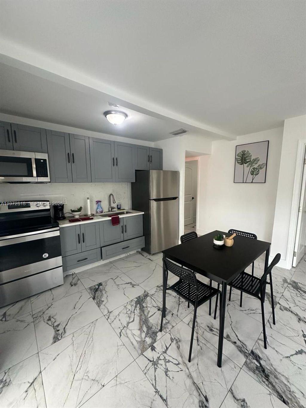 Photo of 104 NW 9th St #3, Hallandale Beach, FL 33009 (MLS # A11972818)