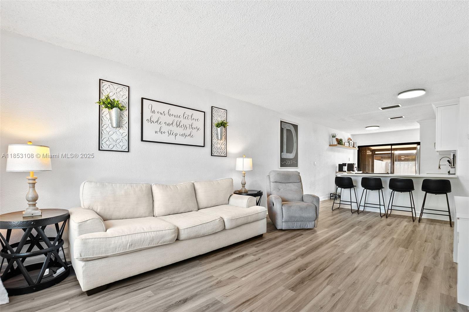 Welcome to this beautifully updated 2-bed, 1-bath single-story townhome located in the heart of Pembroke Pines. Offering 916 sq ft of well-designed living space, this home is perfect for first-time buyers, small families, or anyone looking to downsize without sacrificing comfort.
Enjoy a renovated, open-concept kitchen featuring new appliances, ideal for cooking and entertaining. The living area flows seamlessly into a screened-in back patio, perfect for relaxing or hosting guests year-round. A small private yard and included storage shed offer added space and convenience.
Additional features include accordion shutters for storm protection and low HOA dues, making this home both secure and affordable. Don’t miss this opportunity to own a move-in ready gem in a desirable location!