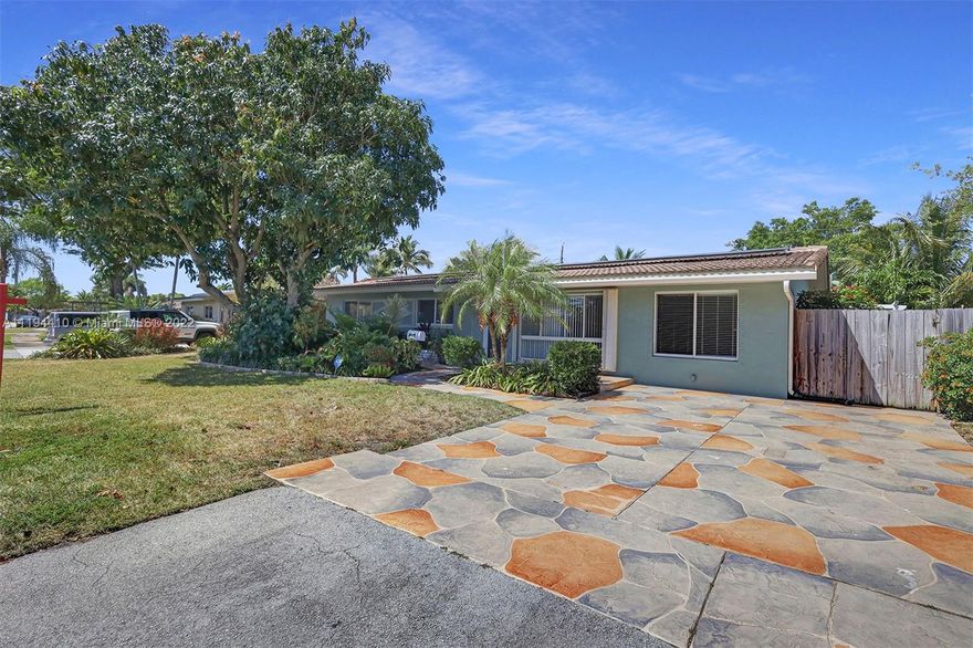 Stunning well kept energy efficient 4B/3B home in Twin Lakes North. The home features 3B/2B in main home and 1/1 private entry in-law quarter with kitchenette and private bath. Excellent for Income potential! Solar panels (paid in full!) The backyard is a beautiful tropical sanctuary that is fully enclosed and ideal for entertaining. Great schools, minutes from the beach, restaurants, shopping, and public transit! Bring your highest and best offer, this home will not last!