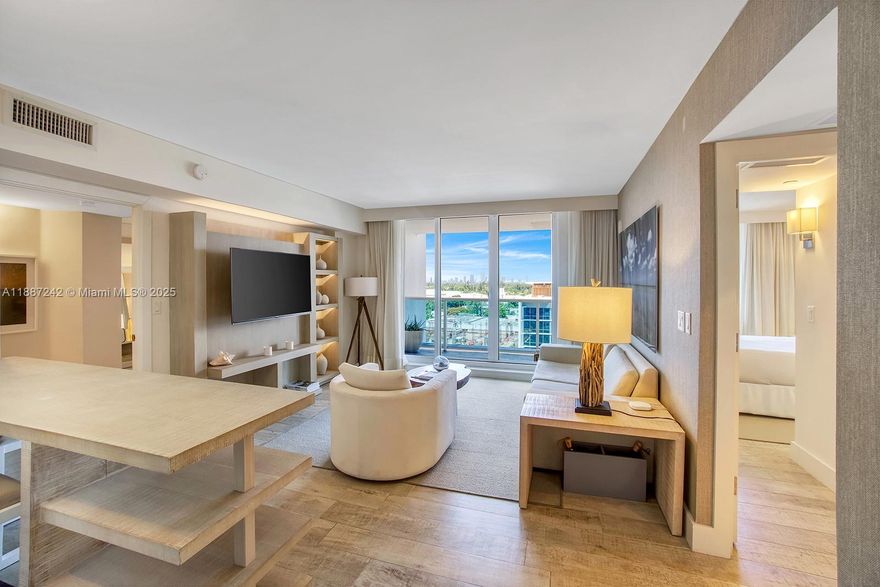 Enjoy stunning bay views from this spacious 2 bed, 2 bath residence at the iconic 1 Hotel & Homes South Beach. This 1,239 sq ft split floor plan features a private balcony and is delivered fully furnished with the exclusive Hotel Furniture Package by world-renowned designer Debora Aguiar. This turnkey residence allows nightly rentals, offering excellent income potential and flexibility. Enjoy full access to luxury resort amenities, including 4 swimming pools—one on the rooftop with panoramic views of the Miami skyline—private residence lobby, valet parking, chauffeured Tesla service, on-site restaurants, beach and poolside service, spa, and more. Experience the best of South Beach living with all the comforts of a luxury hotel. Steps to the beach, shopping, and world-class dining.