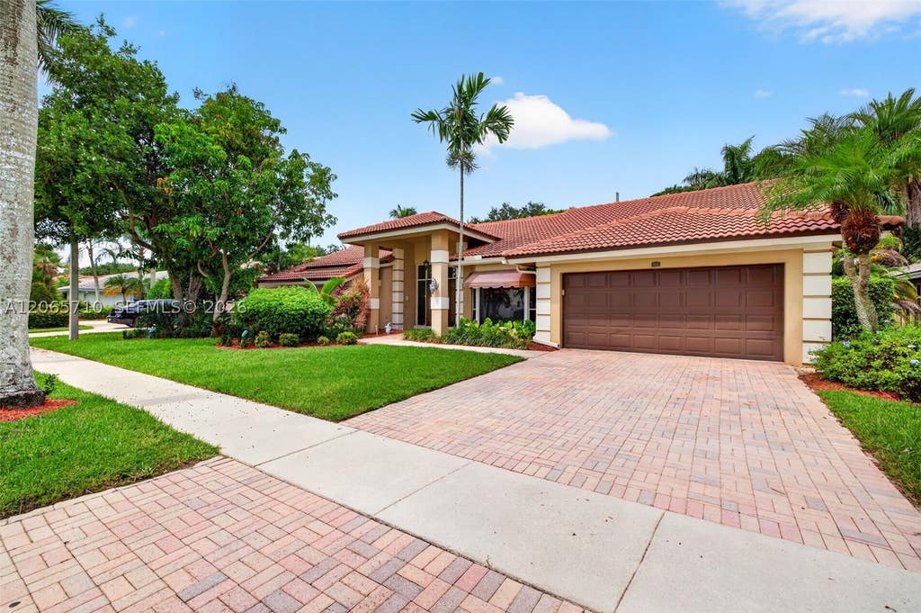 Photo of 581 NW 110th Ave, Plantation, FL 33324 (MLS # A12065710)
