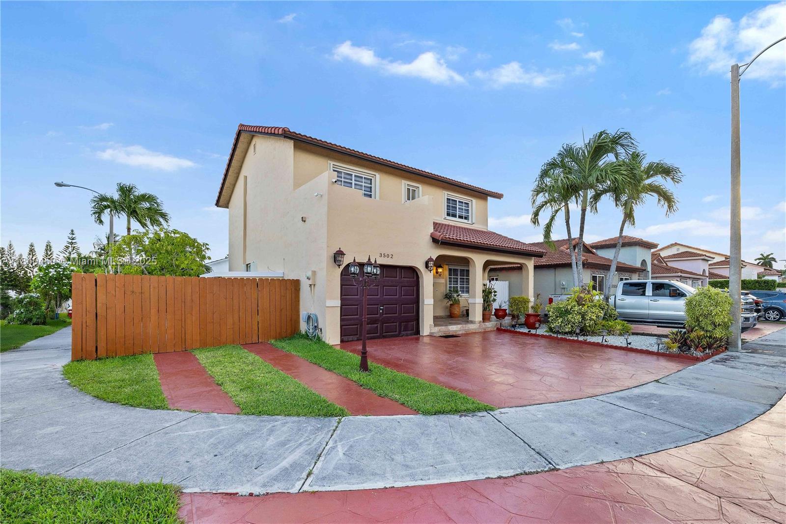 Corner home in the heart of Hialeah Gardens. NO HOA! Featuring 3 bedrooms and 2-1/2 renovated bathrooms, LED lighting, kitchen with stainless steel appliances and granite counters, Impact front and back doors, 6 year old roof (2019), Zebra blinds. All rooms have walking closets. Enjoy outdoor living in the large private all tiled backyard. Conveniently located near top-rated schools, parks, shopping centers and expressways.