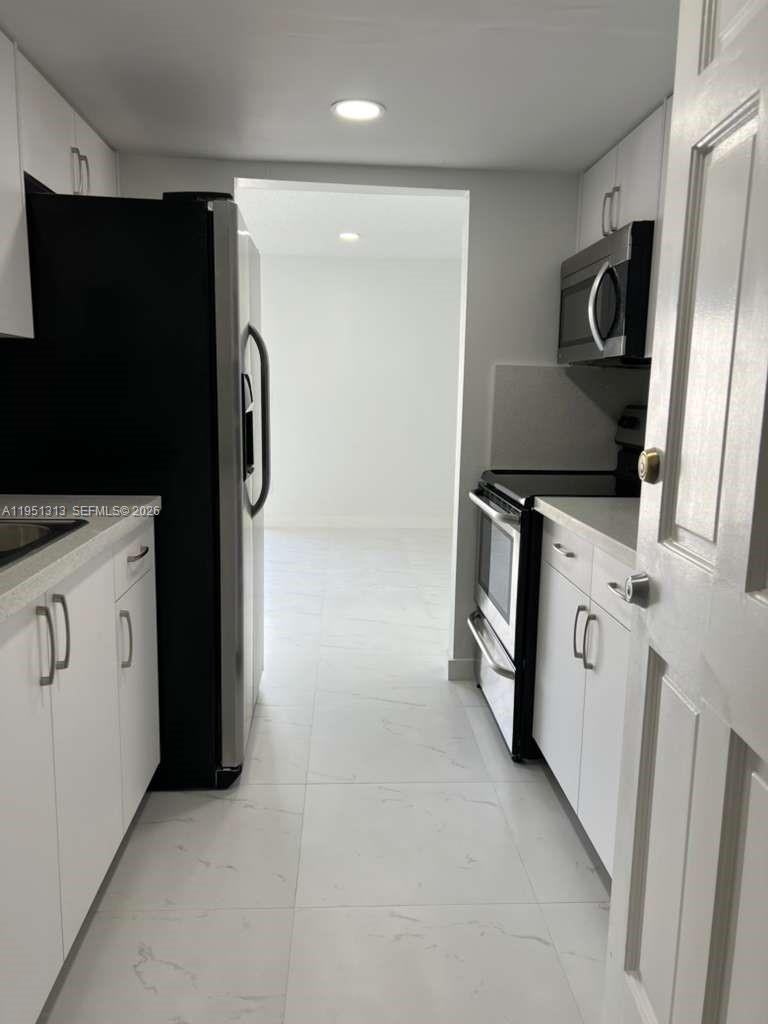 ROYAL POINCIANA CONDO - Residential