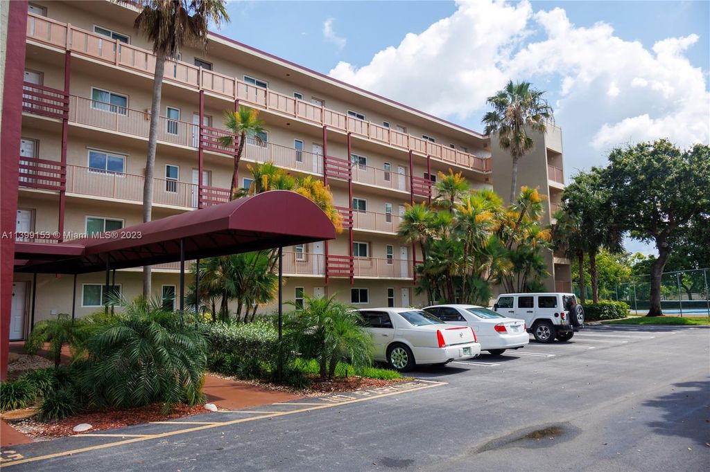 Photo of 2104 S Cypress Bend Dr #209, Pompano Beach, FL 33069 (MLS # A11399153)