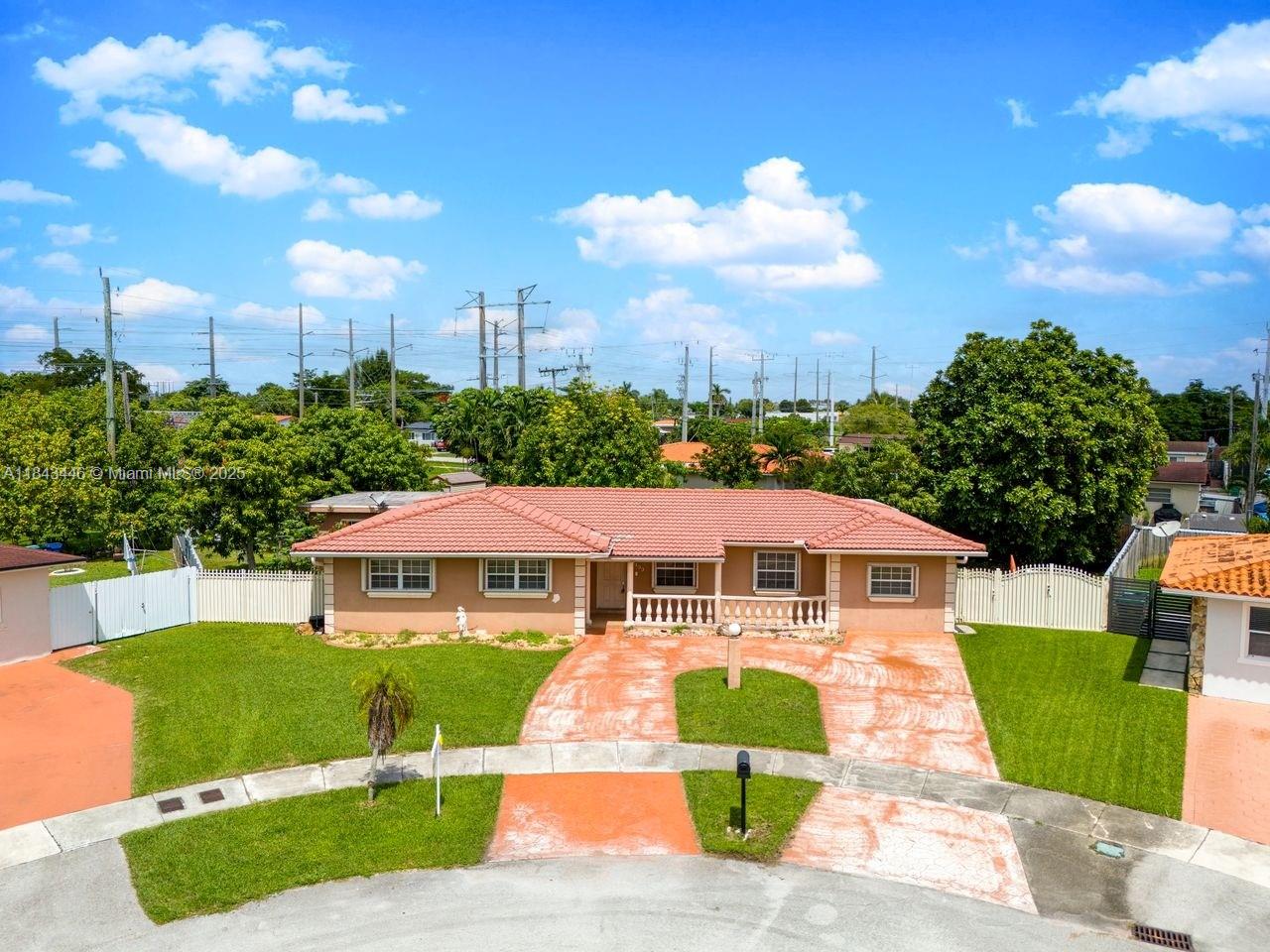 Exceptional cul-de-sac opportunity in Westchester! This spacious property sits on a 13,500sqft lot with a private pool and backyard—great for entertaining or relaxing. The main home offers 3 bedrooms, 2 bathrooms, a living room, and a Florida room, plus a converted garage used as a 4th bedroom with in-suite bath and private entrance. Includes independent in-law quarters with 2 bedrooms, 1 bath, and kitchen, perfect for extended family or rental income. All with permits. The property has gated access on both sides, room for RV or boat parking, and space for 4-car driveway. Maintained in original condition, it’s a perfect canvas to customize. Located just minutes from FIU, top schools, Tropical Park, Baptist Hospital, and major expressways. Don’t miss this opportunity. Pictures coming soon!