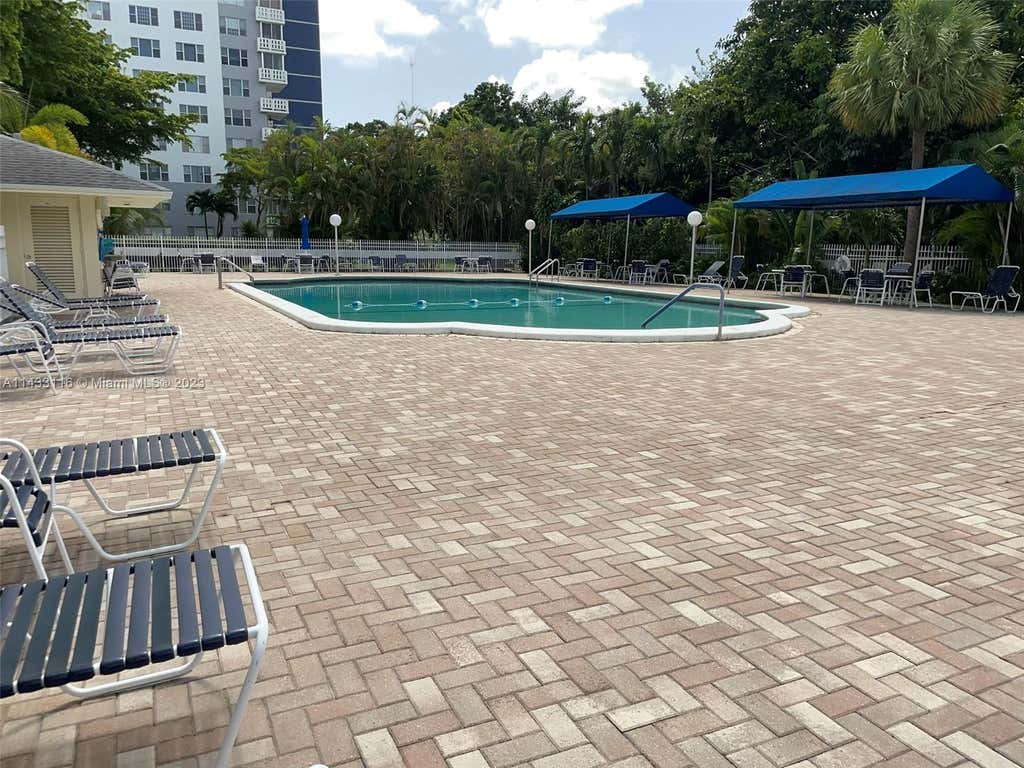 Photo of 4400 Hillcrest Dr #101B, Hollywood, FL 33021 (MLS # A11433116)