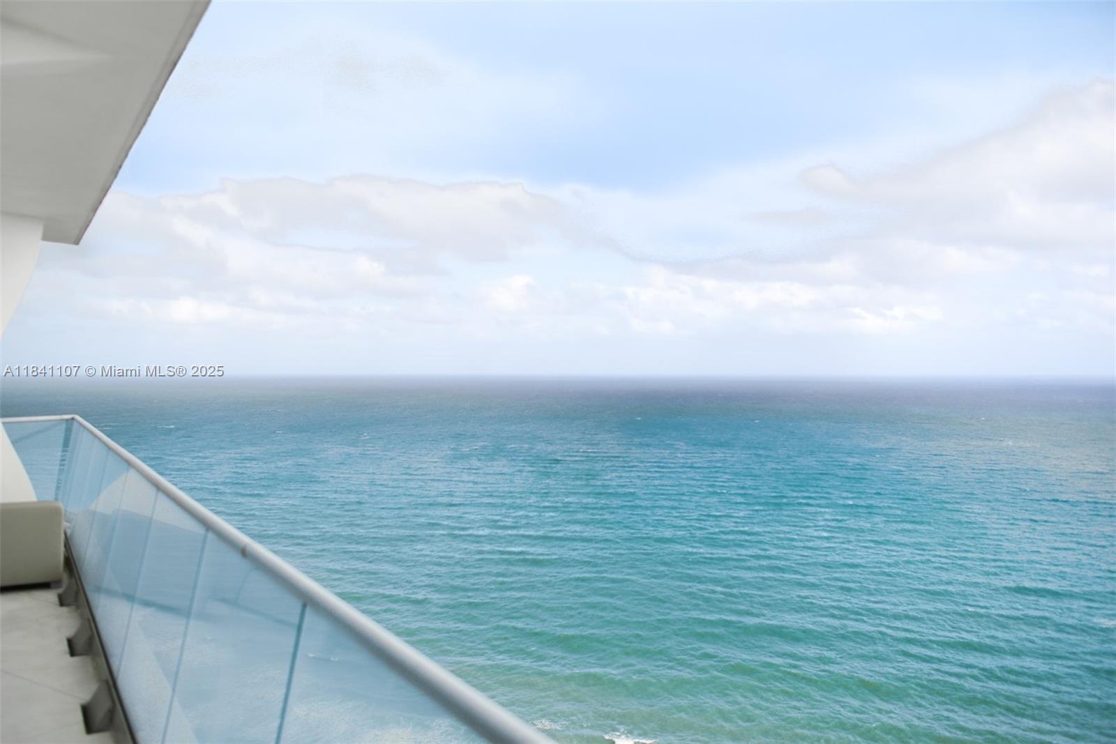 Amazing unit with stunning East and West exposures, offering spectacular views of both the ocean and sunset. Enjoy seamless indoor-outdoor living with lush garden landscapes, a unique connection between the ground floor and the pool, deck, gardens, beach, and ocean. Expansive sculpted terraces provide generous shaded areas, dramatically extending the living space and creating an exceptional lifestyle experience.