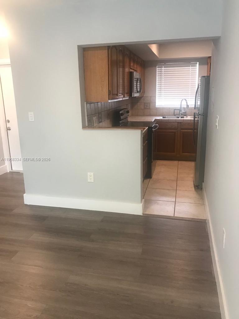 VILLAGE AT DADELAND CONDO - Residential