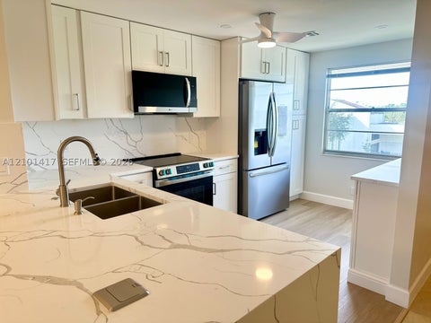Photo of 4098 Yarmouth E #4098, Boca Raton, FL 33434 (MLS # A12101417)