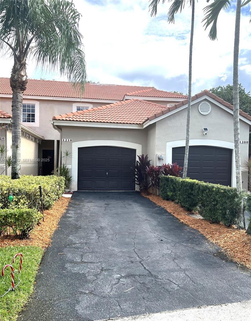 Beautiful townhouse in the great City of Weston with some of the best schools in Broward County. All tiled floors on the first floor, laminates on the second floor. Two master bedrooms with own bathrooms and walking closets on the second floor and a guest half bathroom on the first floor. Breakfast area, full size washer and dryer. Screened patio. One car garage, driveway and guest parking available. This is a gated community. There is a Swimming Pool, Children's Playground, Basketball Courts in the community. This townhouse is close to shopping, restaurants, hospitals and easy access to highways for easy commute in any direction.