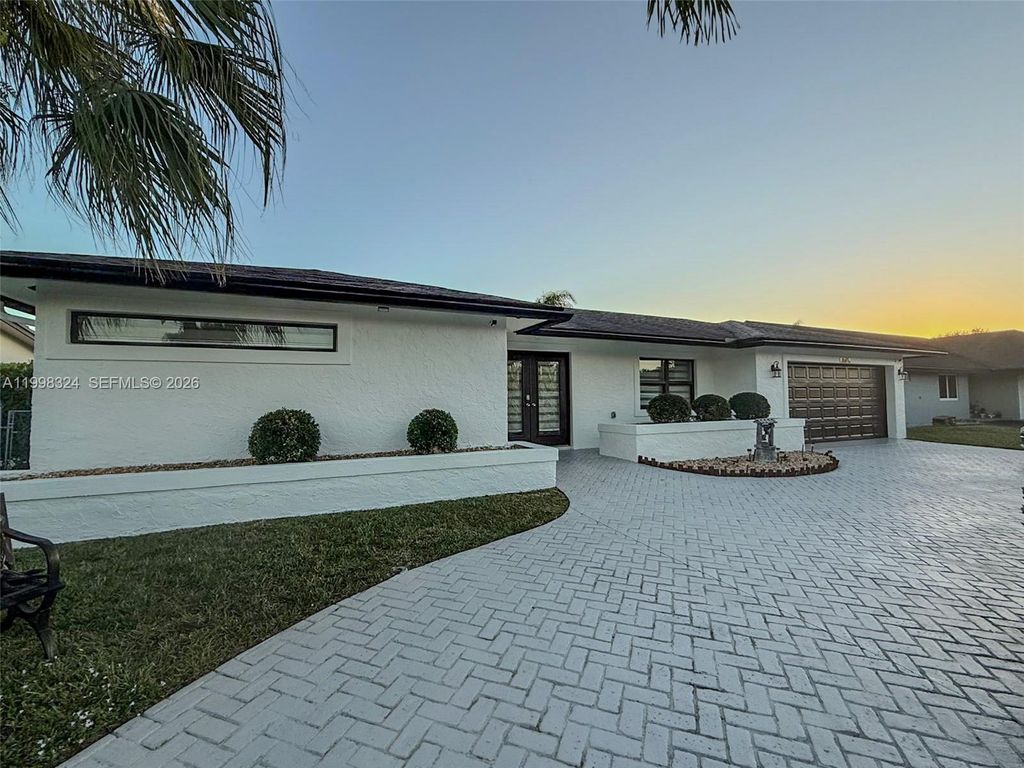 Photo of 11820 NW 23rd St #0, Pembroke Pines, FL 33026 (MLS # A11998324)