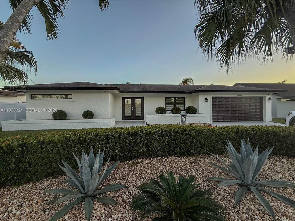 Photo of 11820 NW 23rd St #0, Pembroke Pines, FL 33026 (MLS # A11998324)