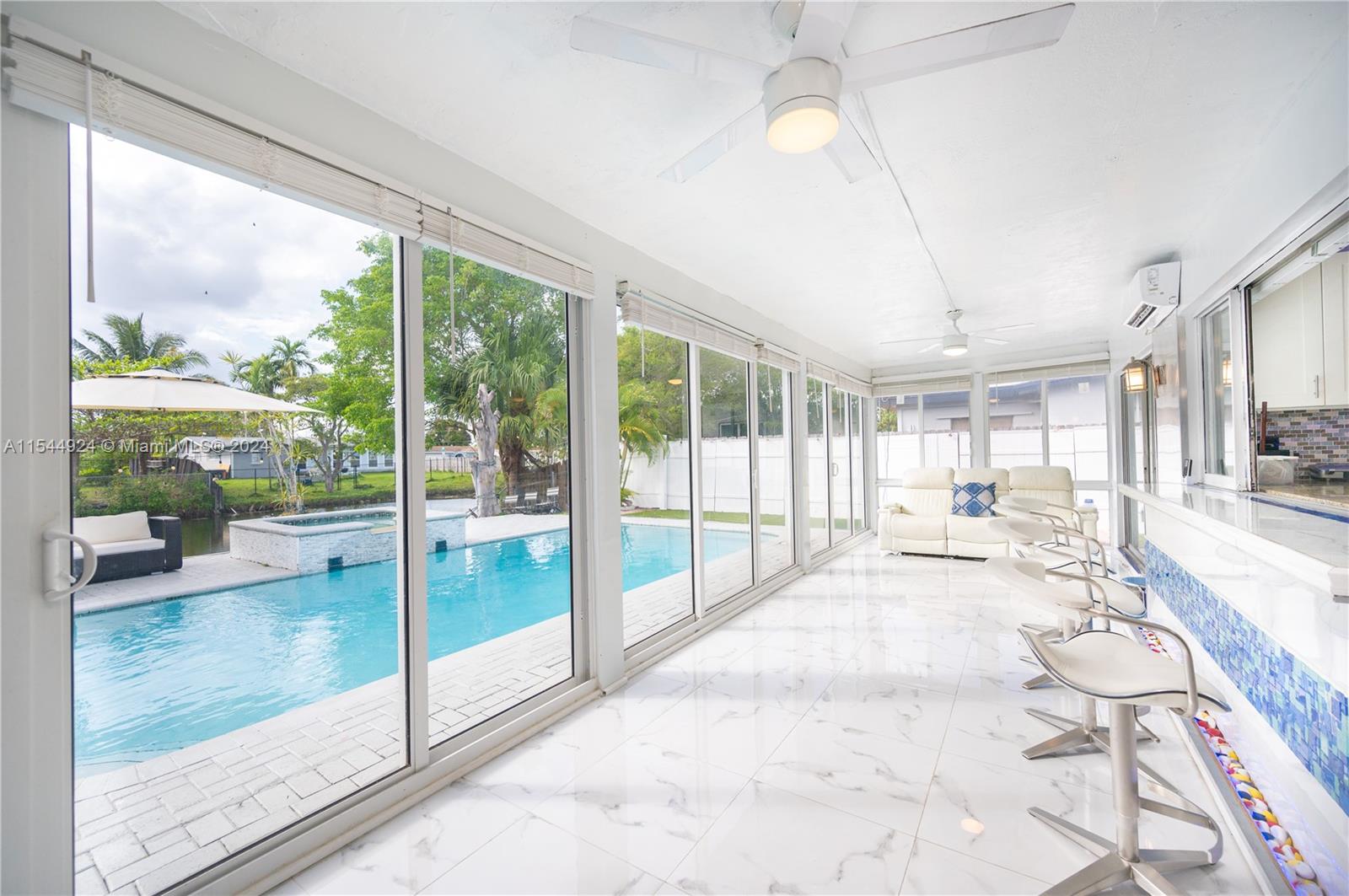 Gorgeous, updated 3 bed 2 bath pool home in a great location in Sunrise area great neighborhood. This home has it all, an oasis within the city, circular paver driveway. Beautiful kitchen features a huge quartz island. Open floor plan overlooks breathtaking pool area w/ water feature & beautiful sunset views. Pool and jacuzzi, surface and all equipments working properly. The backyard is an entertainer's dream w/ outdoor screening with impact windows all under ac area which makes the property much larger than established. The large lot is fully fenced w/ room on both sides. 2 electric car chargers (TESLA AND FORD CHARGER) installed and working perfectly. Electric generator. You truly must see to appreciate!
