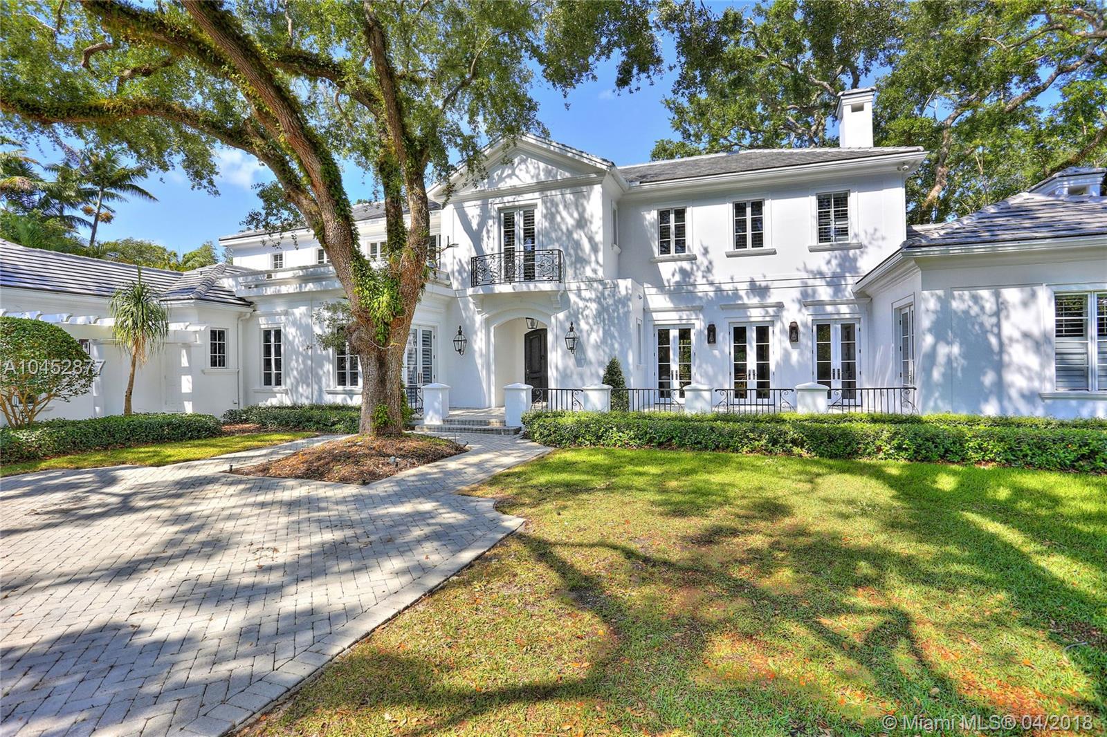 Situated in prestigious, gated Stonegate, this French Provincial home exudes elegance & charm rarely found! The stately exterior hints at the gorgeous details inside like herringbone wd flrs in the foyer & Brazilian cherry thru-out, high ceils, impact drs & wndws w/ wd finish inside & special moldings & baseboards. Renovated kitchen is perfectly and so happy! Sunlight abounds as the space connects w/ the fam rm. Also downstairs are stately frml liv & din rms & cozy wood-paneled library w/ fireplace. The covered patio overlooks the 32,496 SF lot & chic pool & patio. The 2nd flr master is a true escape w/ sitting rm, BR, balcony, renovated spa-like bath, & 2 huge closets. 5 more BRs, 3 car gar, butler’s pantry, & so many special details make this a dream home!